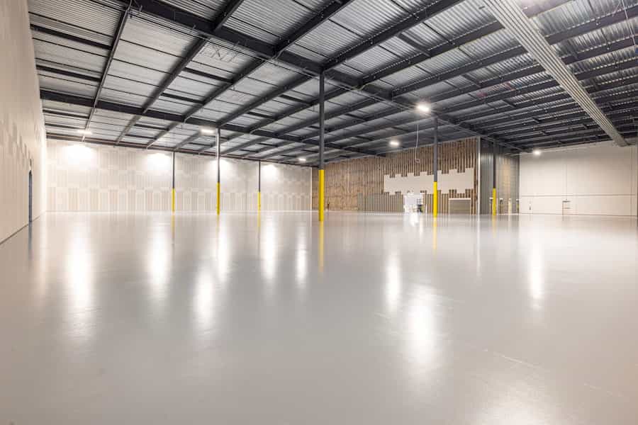 Polished concrete floor in a large industrial warehouse