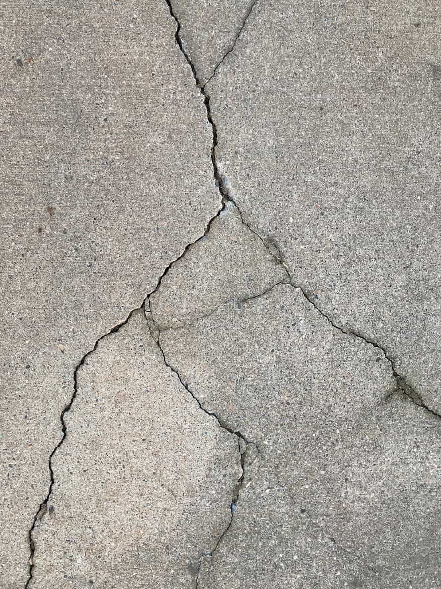 Close-up of a crack running through a concrete slab