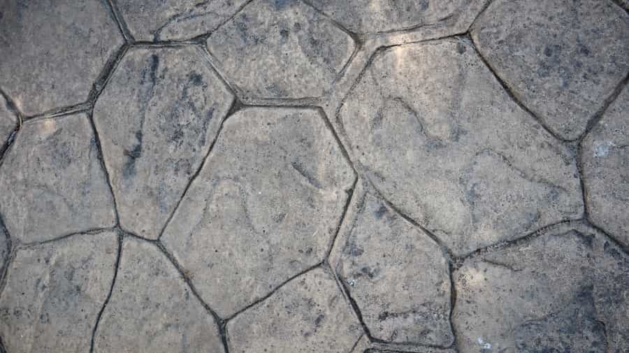 Close-up of stamped concrete with an irregular flagstone pattern