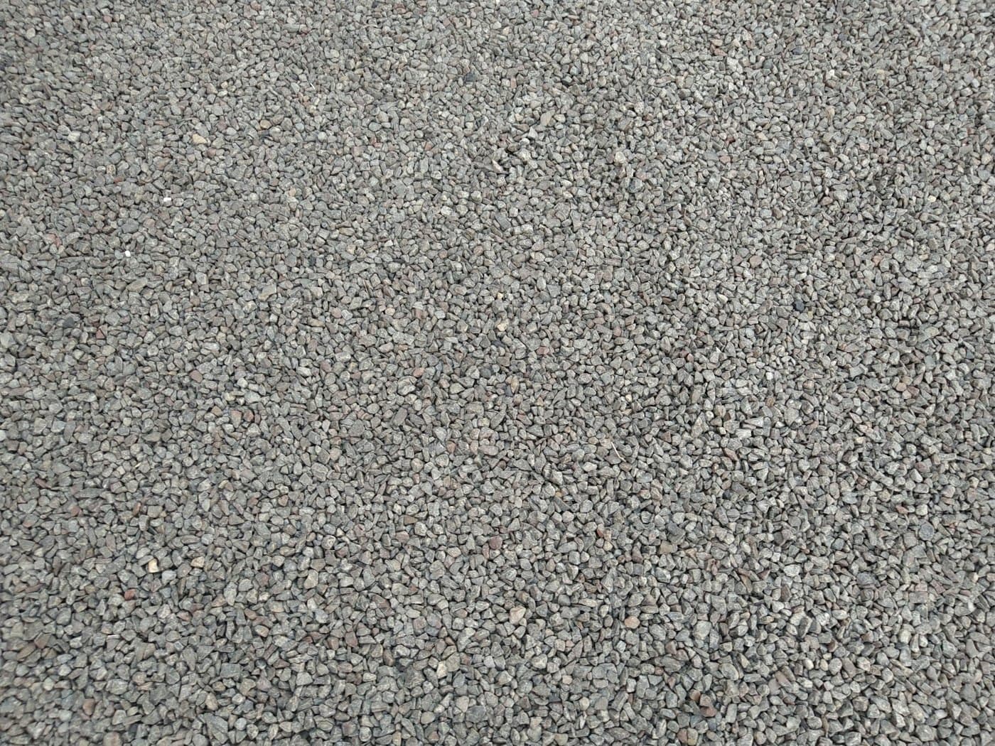 Polished grey concrete floor with a soft reflective sheen