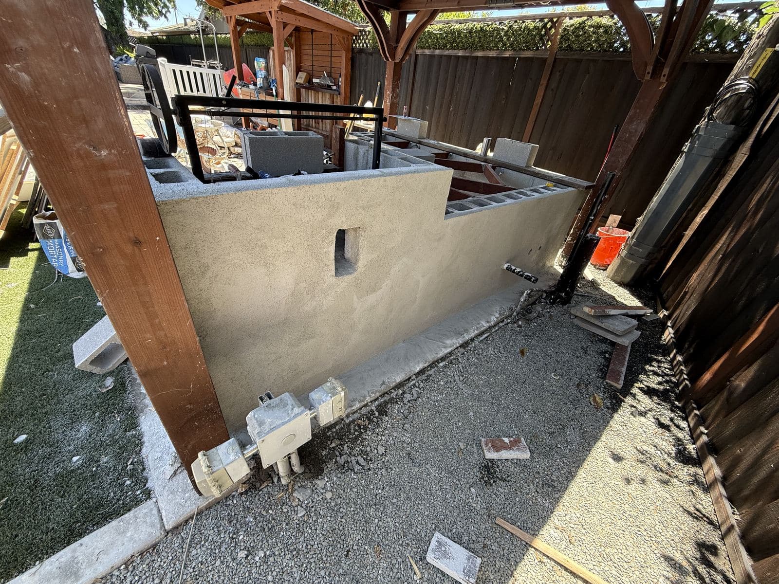Outdoor kitchen island with stucco finish nearing completion
