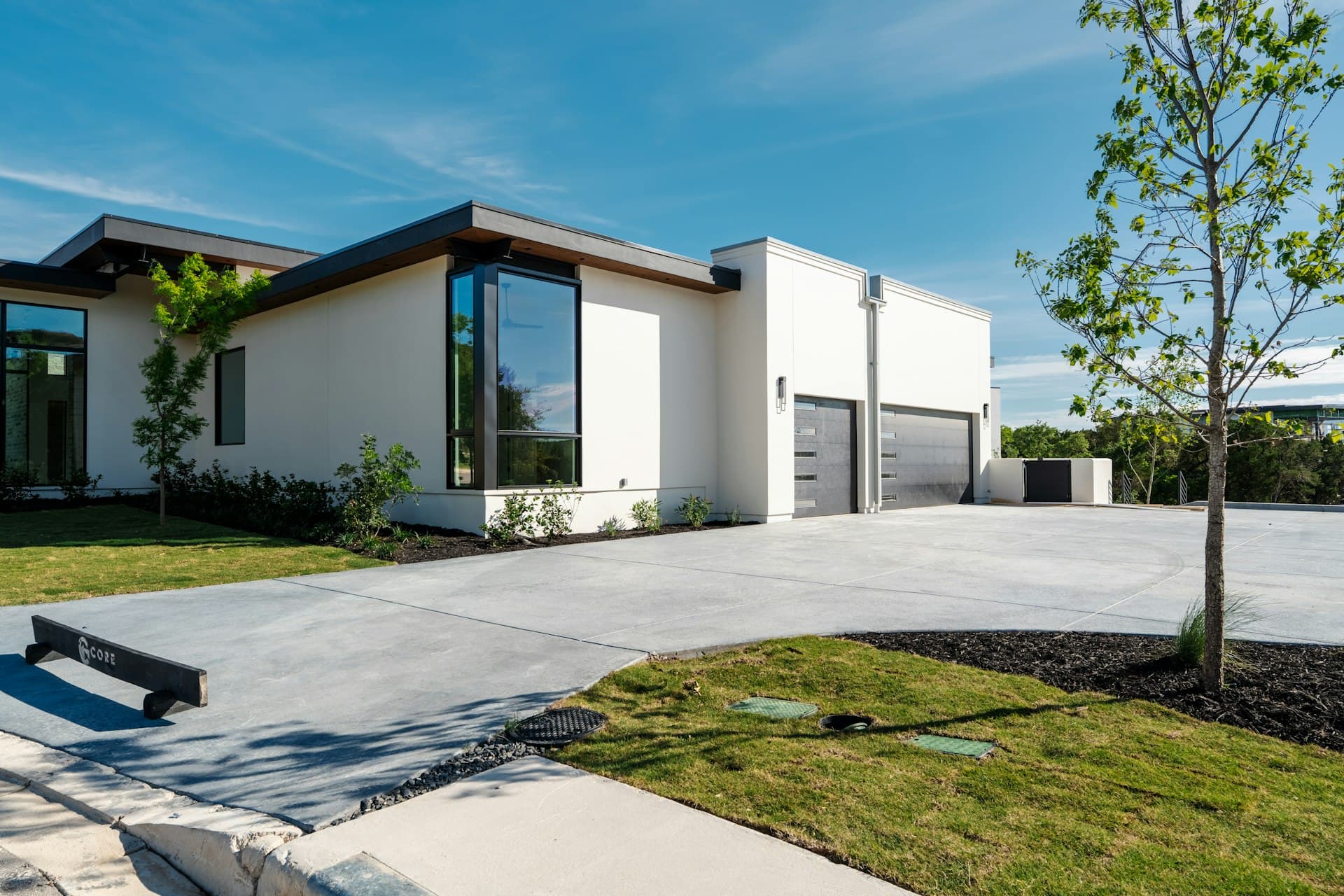 Modern house with a clean concrete driveway