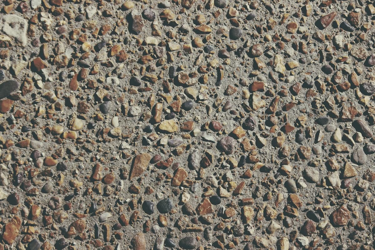 Close-up of exposed stone aggregate in a finished concrete surface