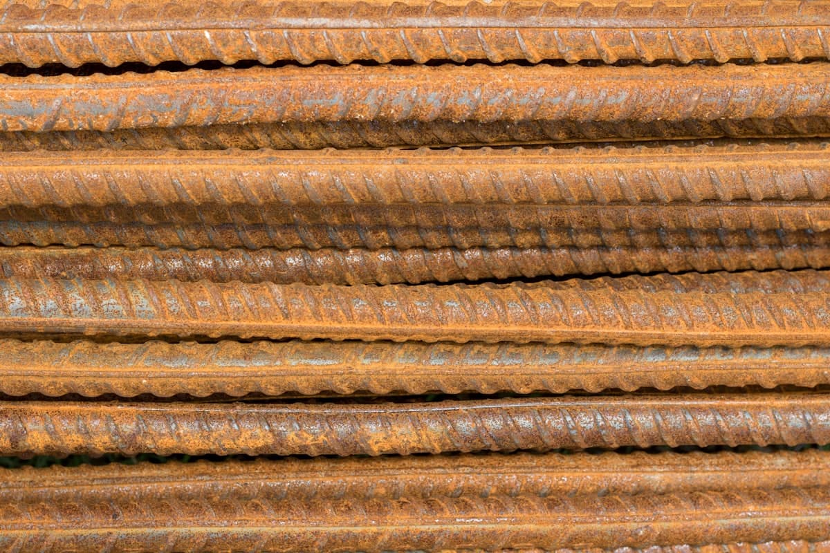 Bundles of steel reinforcing bar stacked on a job site