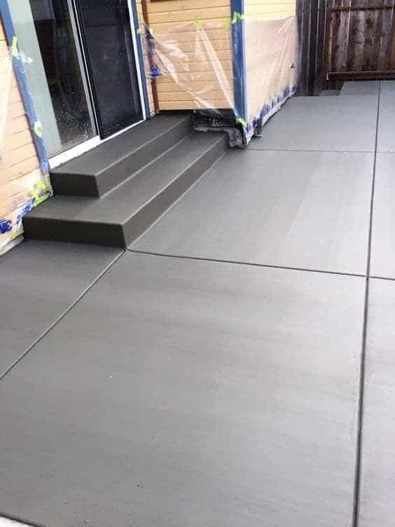 New concrete patio with steps at a San Jose home